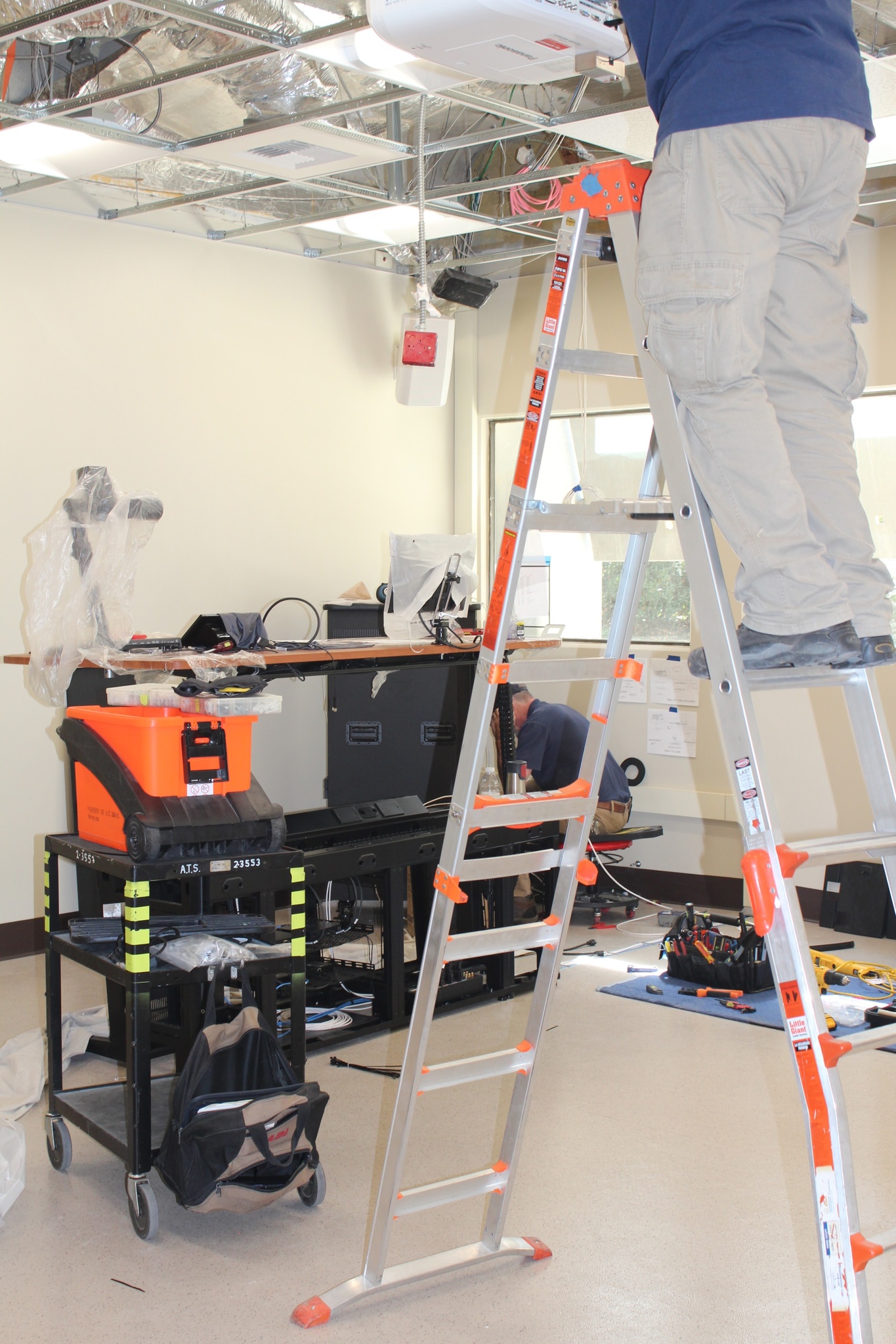 Photo of electricians at work in Olson Hall