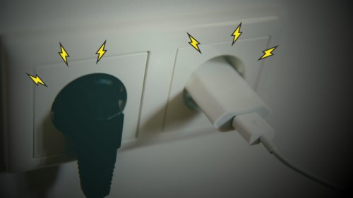 Cables plugged into a power outlet.